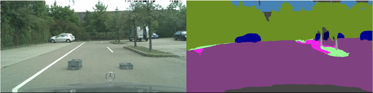 two boxes on the road are missed by a semantic segmentation model